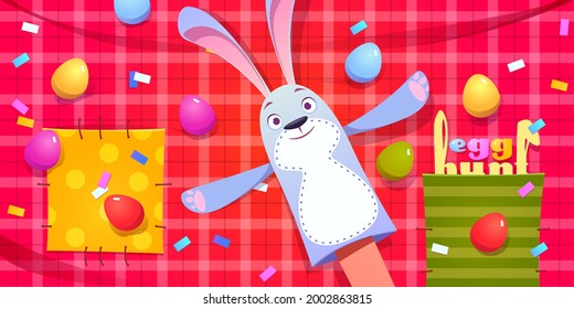 Egg hunt poster. Concept of Easter celebration party, spring holiday event. Vector background with cartoon illustration of bunny puppet on hand, colorful eggs on red tartan plaid with patches