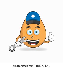 The Egg mascot character becomes a mechanic. vector illustration