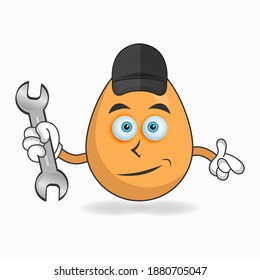 The Egg mascot character becomes a mechanic. vector illustration