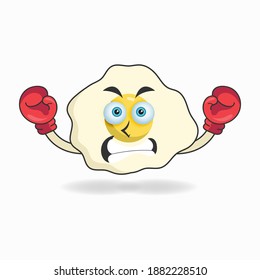 Egg mascot character with boxing gear. vector illustration