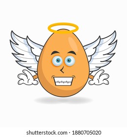 Egg mascot character dressed like an angel. vector illustration