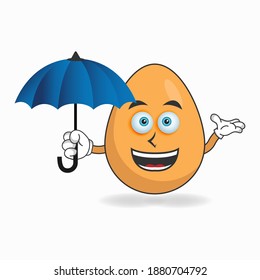 Egg mascot character holding an umbrella. vector illustration