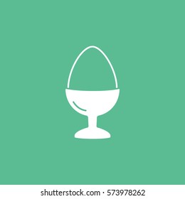 Egg On Stand Flat Icon On Green Background