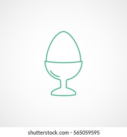 Egg On Stand Green Line Icon On White Background