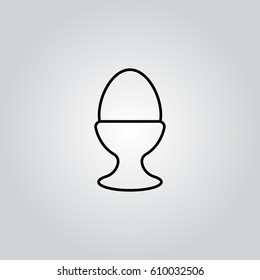 egg on stand outline icon