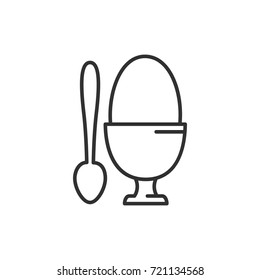 Egg on stand and spoon