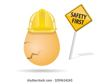 egg wearing helmet with safety first road sign