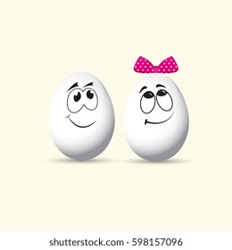 Eggs are a boy and a girl with funny smiles. Happy easter.