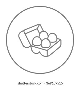 Eggs in carton package line icon.