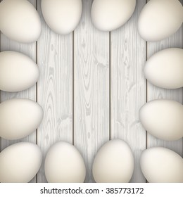 Eggs on the wooden background. Eps 10 vector file.