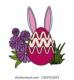 eggs painted with rabbit ears in the garden