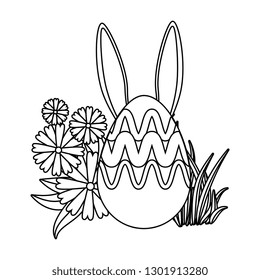 eggs painted with rabbit ears in the garden