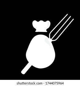 Eggs with shadows, along with  kitchen hat and  fork isolated on  black background