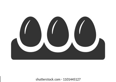 Eggs in the tray, icon. Black and white flat design.
