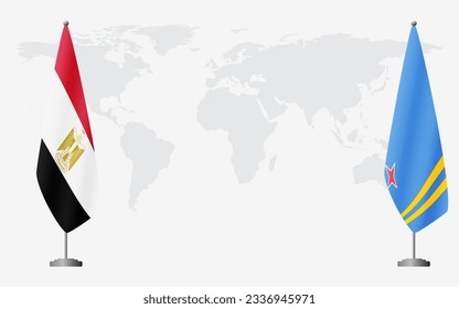 Egypt and Aruba flags for official meeting against background of world map.