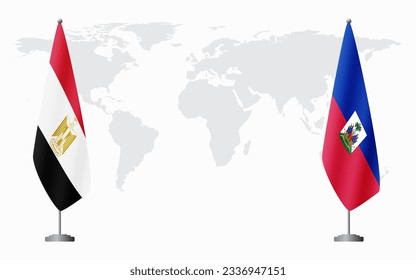 Egypt and Haiti flags for official meeting against background of world map.