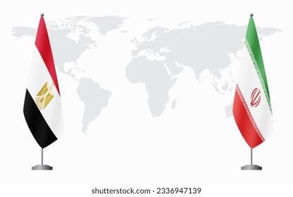 Egypt and Iran flags for official meeting against background of world map.