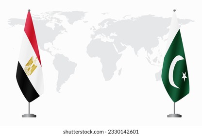 Egypt and Pakistan flags for official meeting against background of world map.