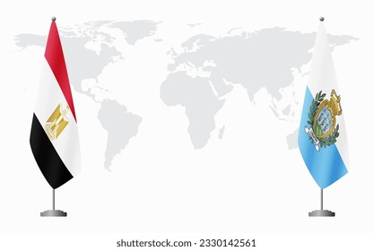 Egypt and San Marino flags for official meeting against background of world map.