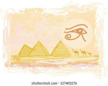 Egypt symbols and Pyramids - Traditional Horus Eye symbol and camel silhouette in front