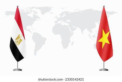 Egypt and Vietnam flags for official meeting against background of world map.