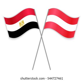 Egyptian and Austrian crossed flags. Egypt combined with Austria isolated on white. Language learning, international business or travel concept.