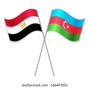 Egyptian and Azeri crossed flags. Egypt combined with Azerbaijan isolated on white. Language learning, international business or travel concept.