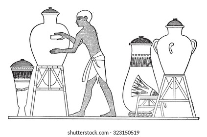 Egyptian finishing a vase, vintage engraved illustration.
