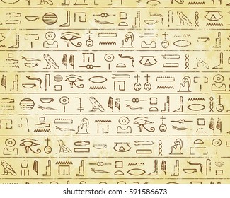 Egyptian hieroglyphics on faded parchment background
