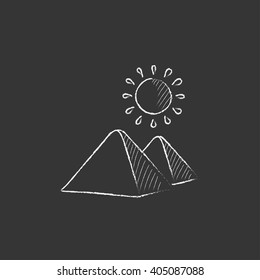 Egyptian pyramids. Drawn in chalk icon.