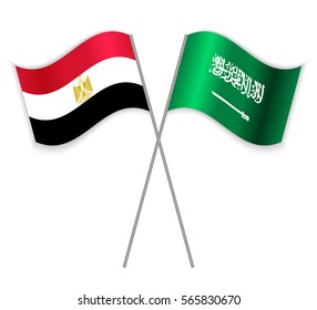 Egyptian and Saudi Arabian crossed flags. Egypt combined with Saudi Arabia isolated on white. Language learning, international business or travel concept.