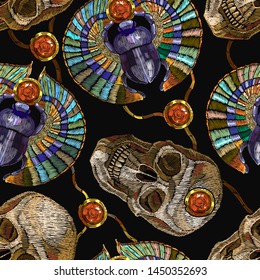 Egyptian scarab and pharaoh skulls seamless pattern. Embroidery antique jewelry. Gold bug. Ancient Egypt art. Fashion template for clothes, t-shirt design 