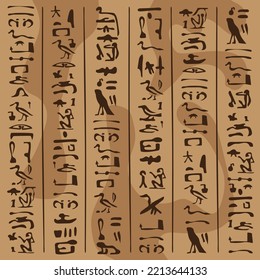 Egyptian writing in hieroglyphs dark on light in brown tones