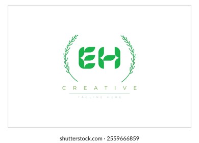 EH letters eco logo with leaf. Fresh nature and healthy leaf logo design.