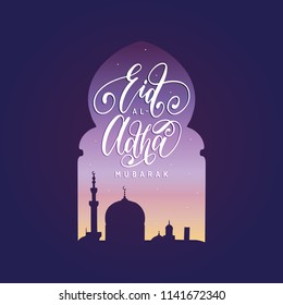 Eid al-Adha Mubarak calligraphic inscription translated into English as Feast of the Sacrifice. Drawn mosque night view from arch. Arabic design background. Handwritten greeting card, invitation etc.