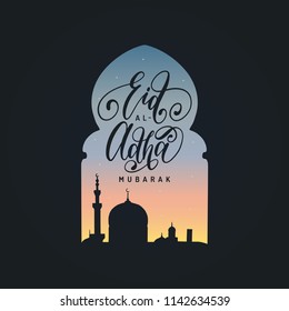 Eid al-Adha Mubarak calligraphic inscription translated into English as Feast of the Sacrifice. Drawn mosque night view from arch. Arabic design background. Handwritten greeting card, invitation etc.