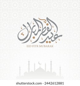 Eid Fitr Mubarak greeting card arabic calligraphy with silhouette mosque and arabesque style , translation : "blessed eid al fitr"