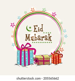 Eid Mubarak celebrations greeting card design with golden circle frame and gift boxes on abstract background. 