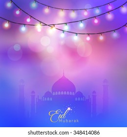 Eid Mubarak colorful glow bulb lamp greeting background - Translation of text : Eid Mubarak - Blessed festival