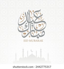 Eid Mubarak greeting card arabic calligraphy with silhouette mosque and arabesque style , translation : "blessed eid"