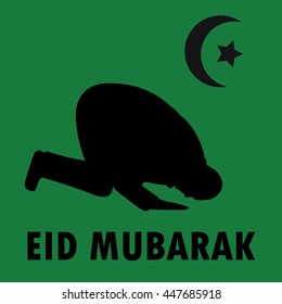 Eid Mubarak. A man who prays.