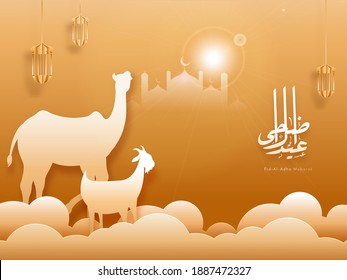 Eid-Al-Adha Mubarak Calligraphy in Arabic Language with Silhouette Camel, Goat and Hanging Lanterns on Sunshine Bronze and Paper Cut Clouds Background.