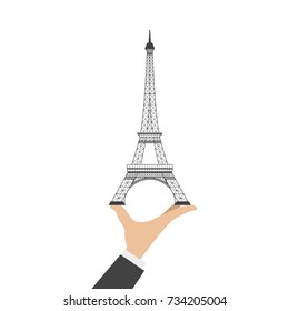 Eiffel tower and hand isolated on a white background