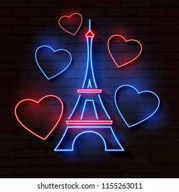 Eiffel tower in neon light on brick background