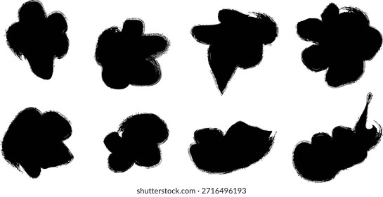 Oito manchas de tinta preta de forma irregular dispostas em duas fileiras sobre um fundo branco plano, lembrando um teste de Rorschach