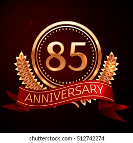 Eighty five years anniversary celebration with golden ring and ribbon.