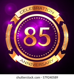 Eighty five years anniversary celebration with golden ring and ribbon on purple background.