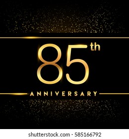 eighty five years anniversary celebration logotype. 85th anniversary logo with confetti golden colored isolated on black background, vector design for greeting card and invitation card