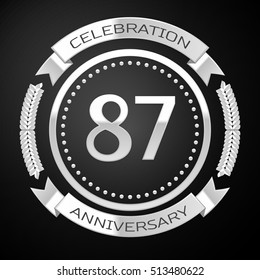 Eighty seven years anniversary celebration with silver ring and ribbon on black background. Vector illustration