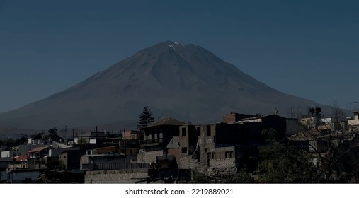 El Misti volcano overlooks the city of Arequipa in southern Peru. Arequipa is the second most populated city in the country. Arequipa is located in the Andes mountains.